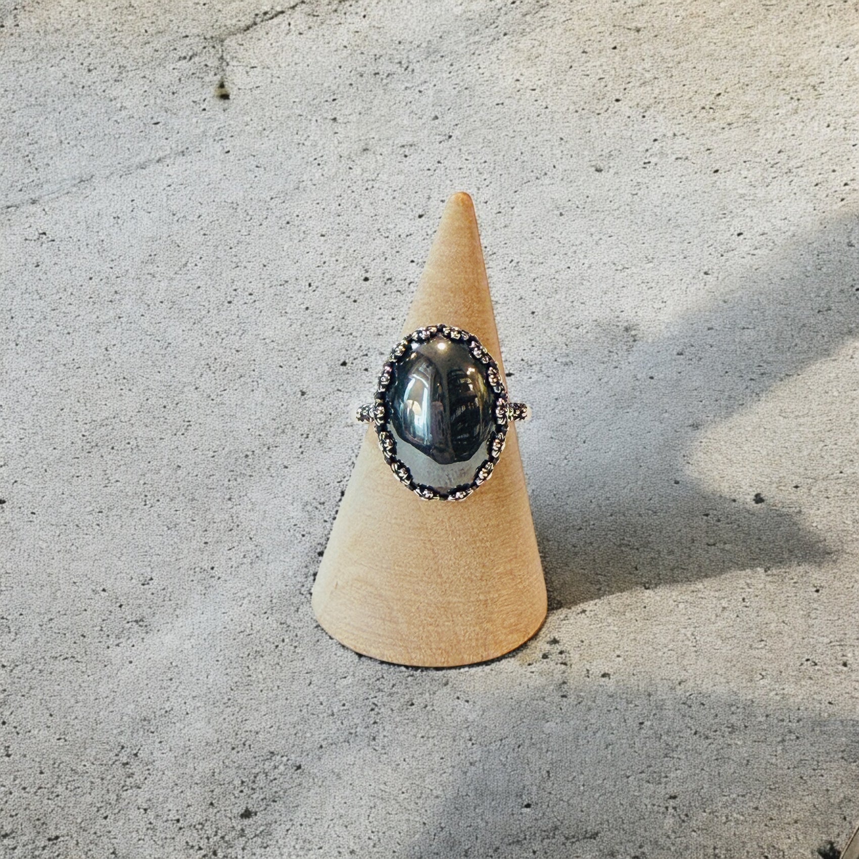 One-of-a-Kind Smooth Oval Natural Hematite Floral Bezel Sterling Silver Ring