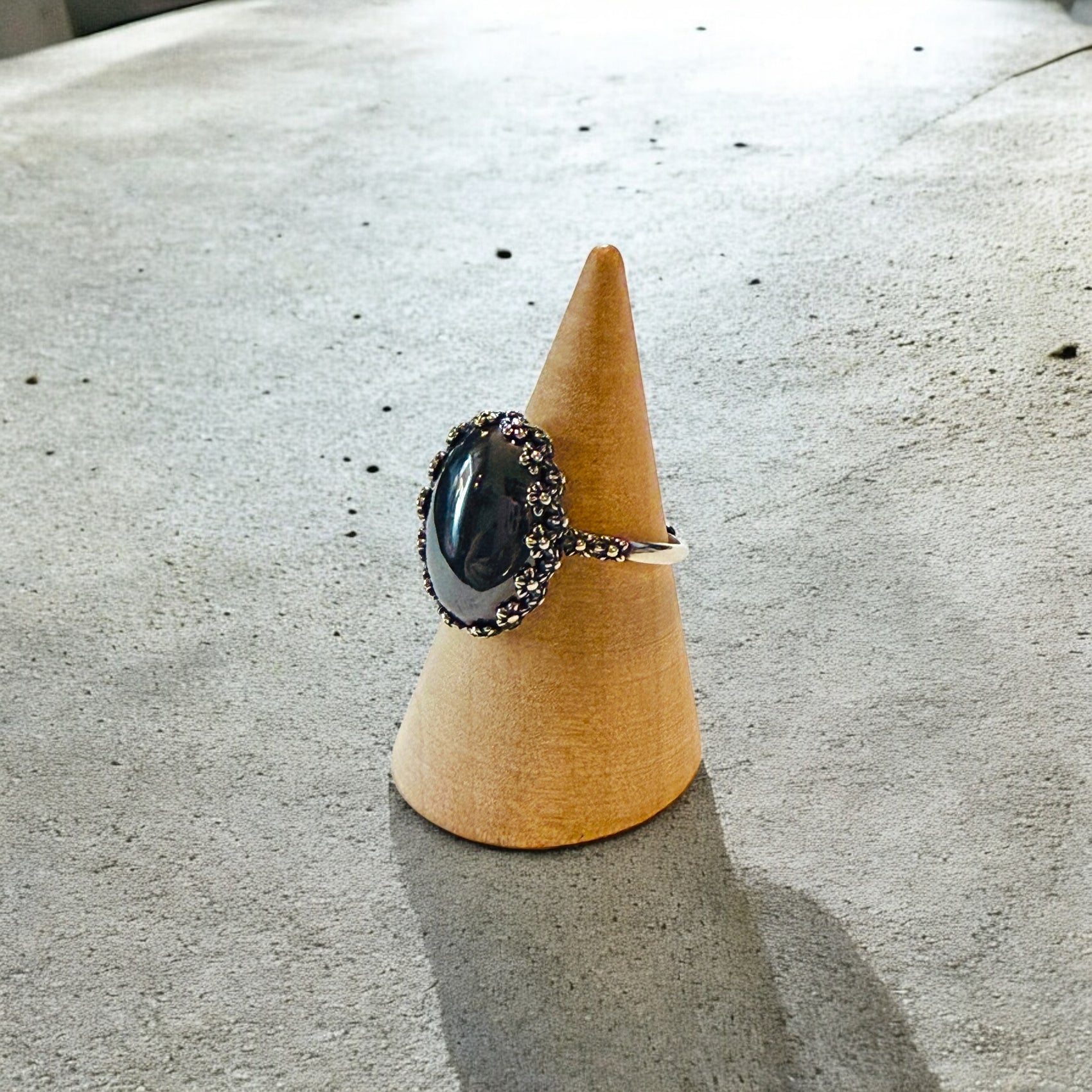 One-of-a-Kind Smooth Oval Natural Hematite Floral Bezel Sterling Silver Ring