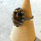 One-of-a-Kind Smooth Oval Natural Tiger Iron Floral Bezel Sterling Silver Ring